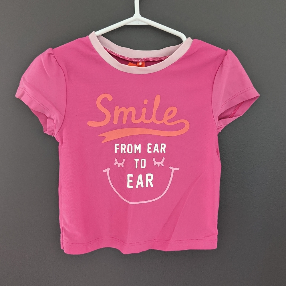 Smile from ear to ear pink swimsuit top
